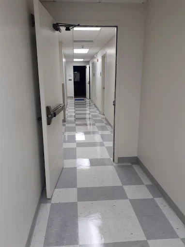 Polished hallway tile after professional floor care